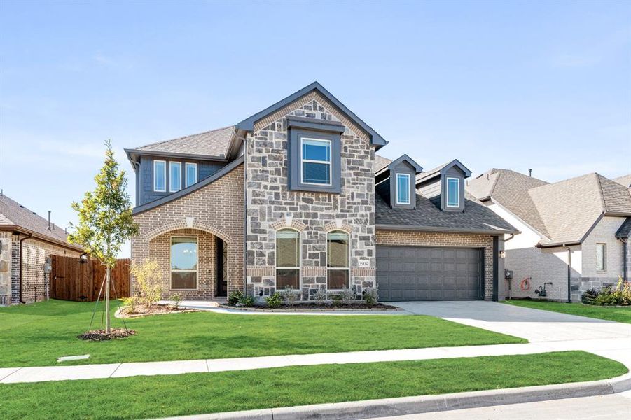 Front exterior of a new home in Ridge Ranch Classic 60, Mesquite, TX, highlighting curb appeal (Image 2).