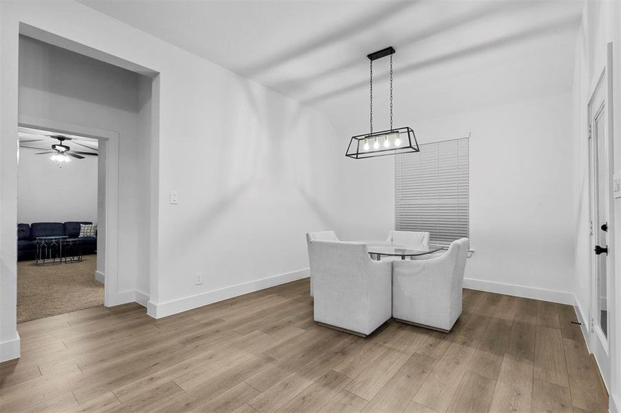 Dining space featuring light hardwood / wood-style floors and ceiling fan