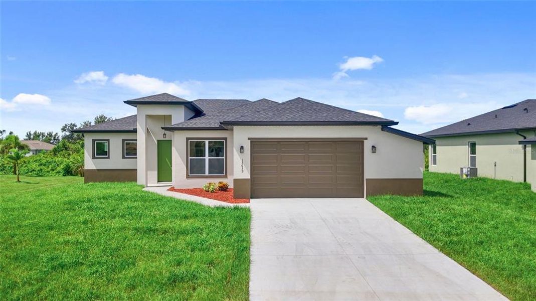 Front exterior of a new home in , Port Charlotte, FL, highlighting curb appeal (Image 17).