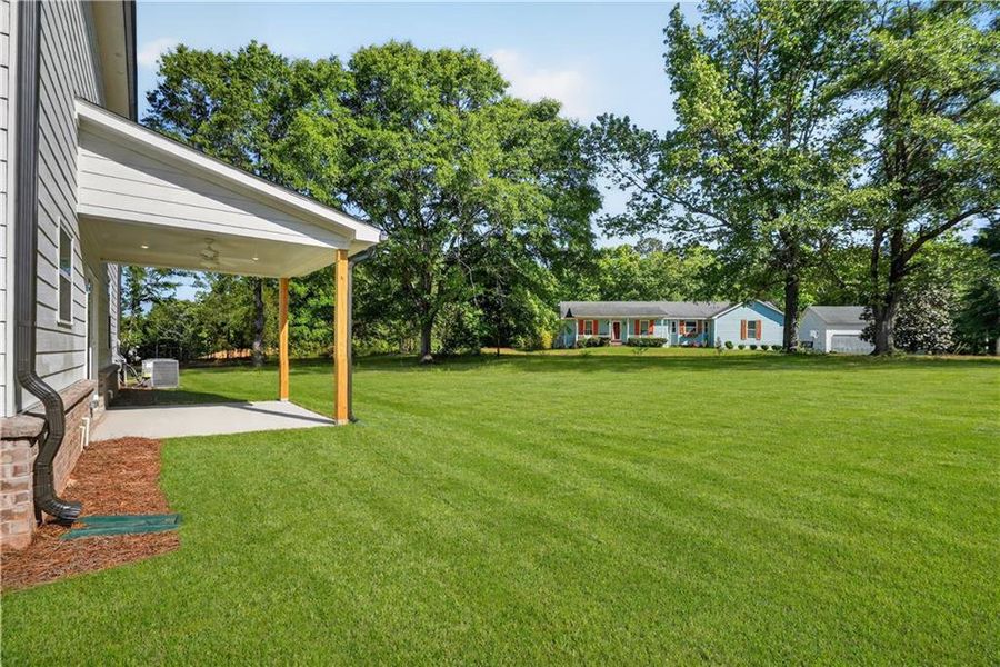 Exterior details and patio area of a home in Shadow Creek, Jackson (Image 20).