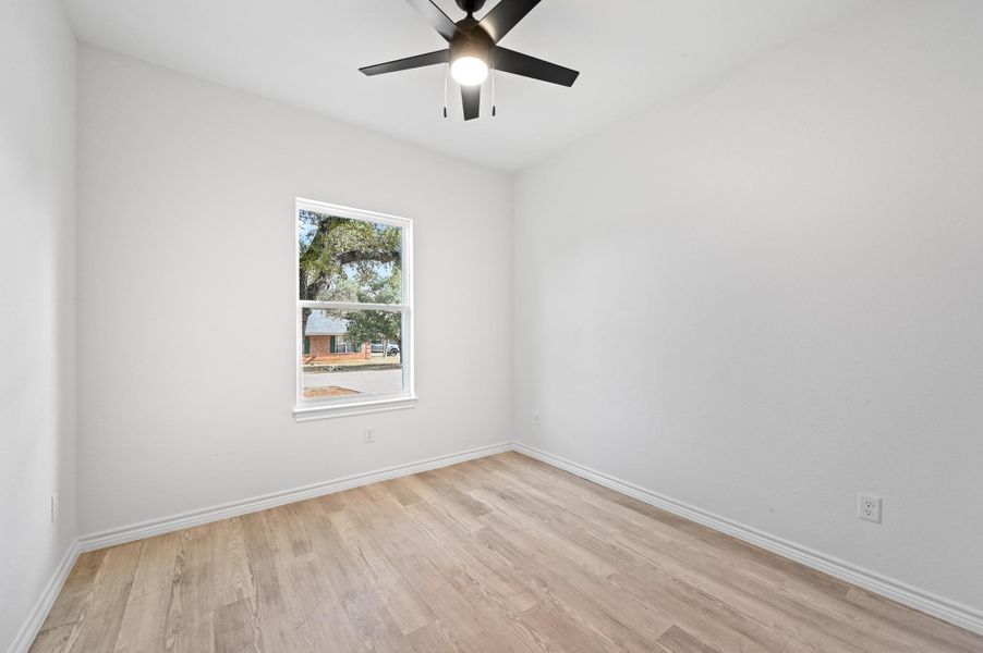 Spacious, unfurnished interior of a new home in , Wimberley (Image 25).