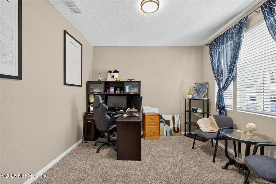 Furnished interior view inside a new home in River Glen Express, Yulee (Image 45).