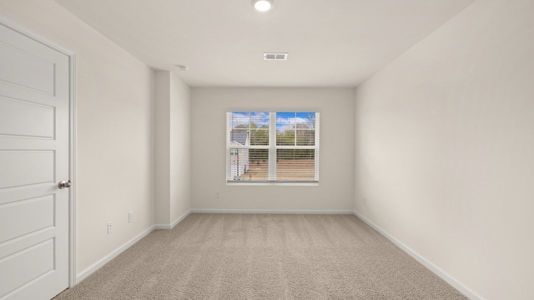 Spacious, unfurnished interior of a new home in Young's Crossing, Stone Mountain (Image 16).