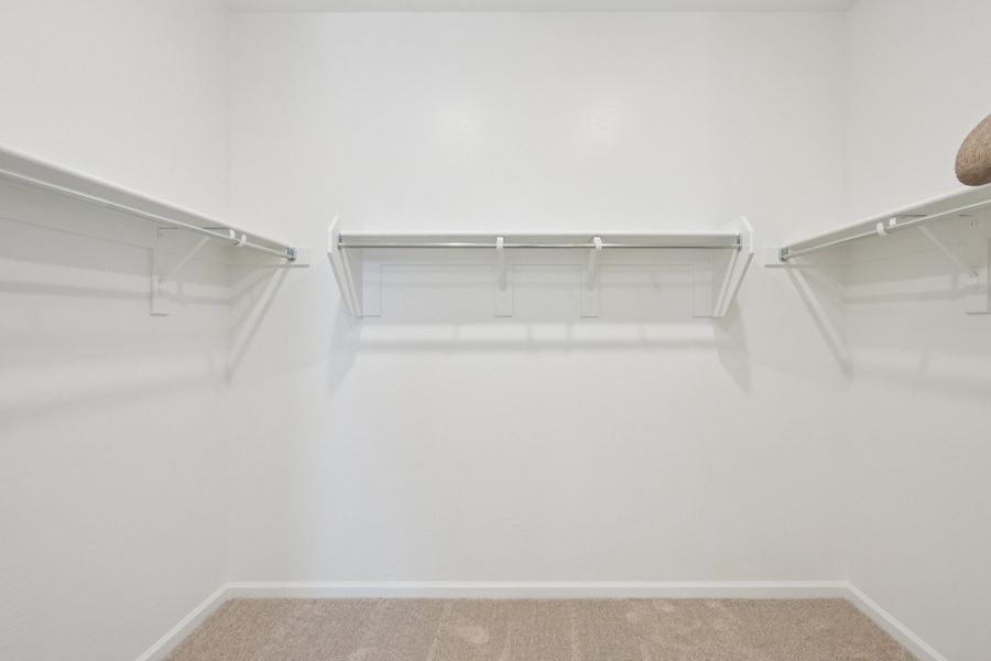 Primary walk in closet Primary walk in closet