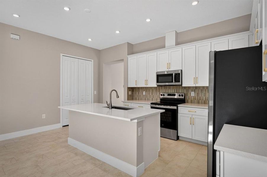 Furnished interior view inside a new home in Gray Hawk at Hole Two, Daytona Beach (Image 7).