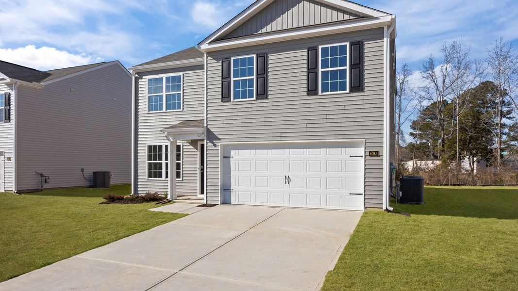 Front exterior of a new home in Madeline Farm, New Bern, NC, highlighting curb appeal (Image 18).