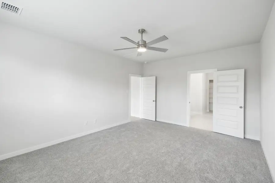 Primary Suite in the Winters home plan by Trophy Signature Homes – REPRESENTATIVE PHOTO