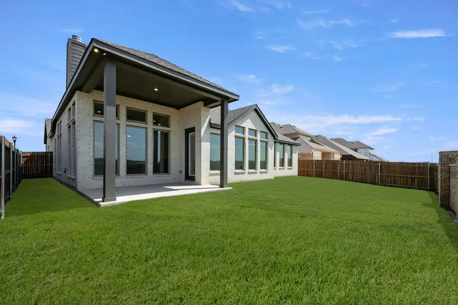 Exterior details and patio area of a home in Panchasarp Farms, Burleson (Image 3).