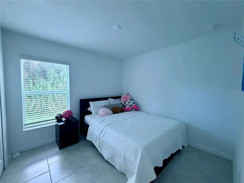 Furnished interior view inside a new home in , Port Charlotte (Image 14).