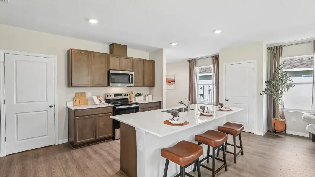 Furnished interior view inside a new home in Farm at Varrea, Plant City (Image 12).