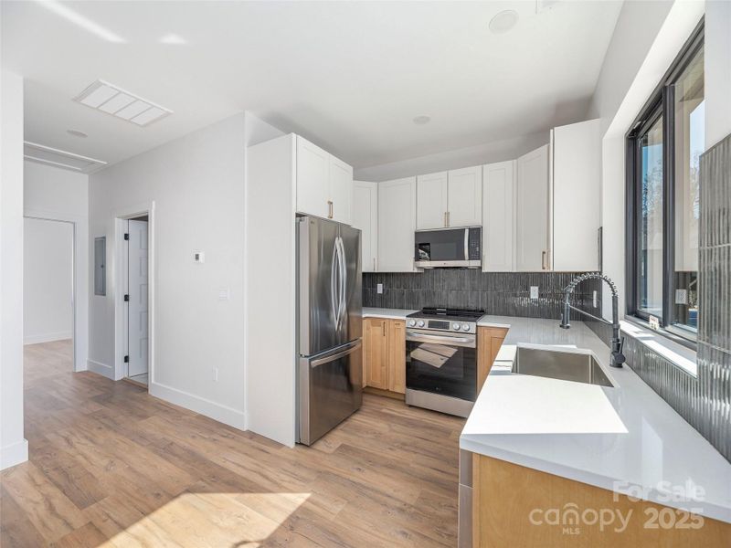 Furnished interior view inside a new home in , Waynesville (Image 4).