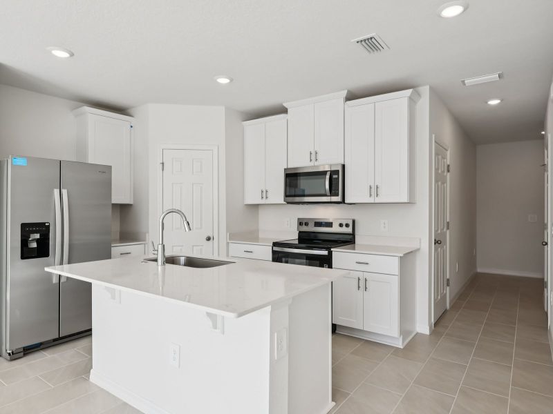 Furnished interior view inside a new home in Cagan Crossings West, Clermont (Image 4).