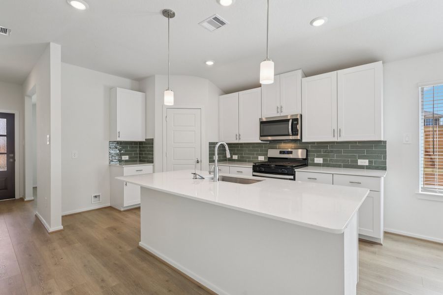 Furnished interior view inside a new home in Riviera Pines - Premier Series, Huffman (Image 4).