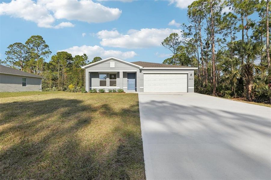 Front exterior of a new home in Sun 'N Lake, Sebring, FL, highlighting curb appeal (Image 2). Front exterior of a new home in Sun 'N Lake, Sebring, FL, highlighting curb appeal (Image 2).