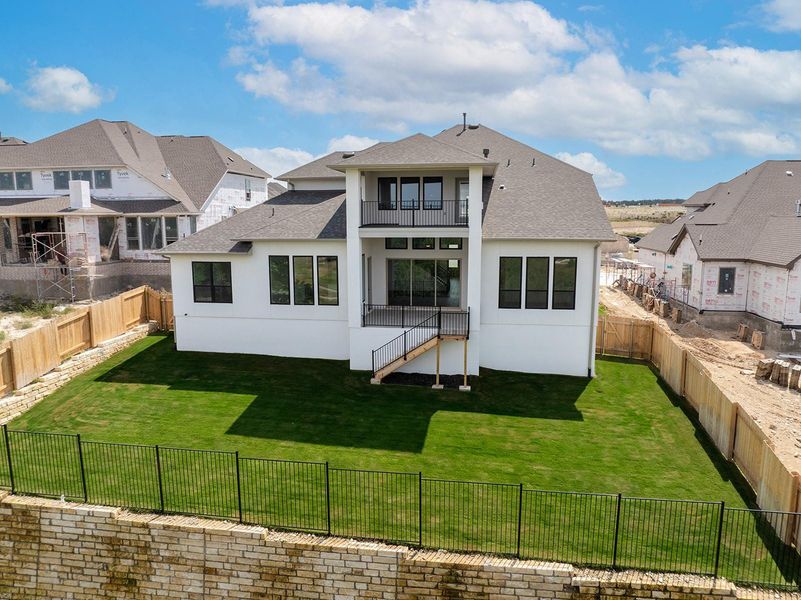 Exterior details and patio area of a home in Lariat - 80', Liberty Hill (Image 19). Exterior details and patio area of a home in Lariat - 80', Liberty Hill (Image 19).