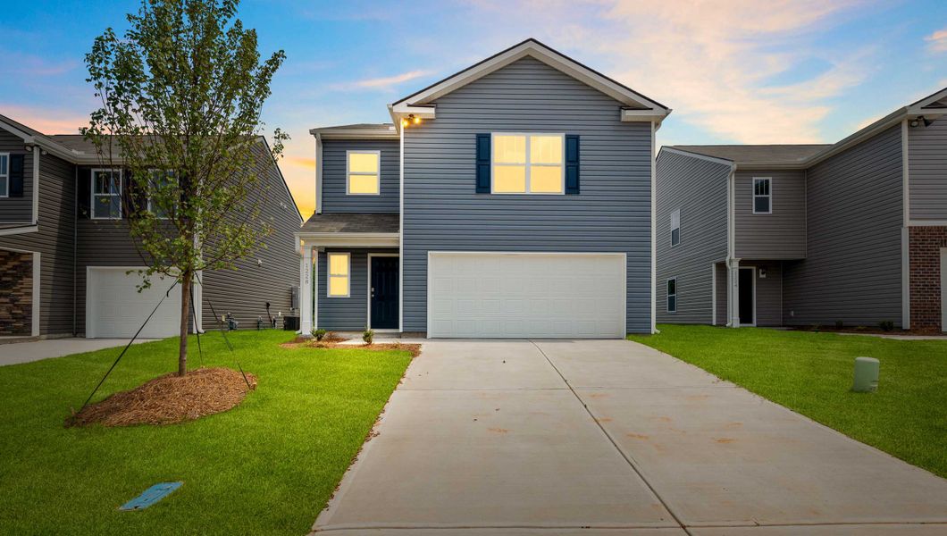 Front exterior of a new home in Providence Walk, Hendersonville, NC, highlighting curb appeal (Image 1). Front exterior of a new home in Providence Walk, Hendersonville, NC, highlighting curb appeal (Image 1).