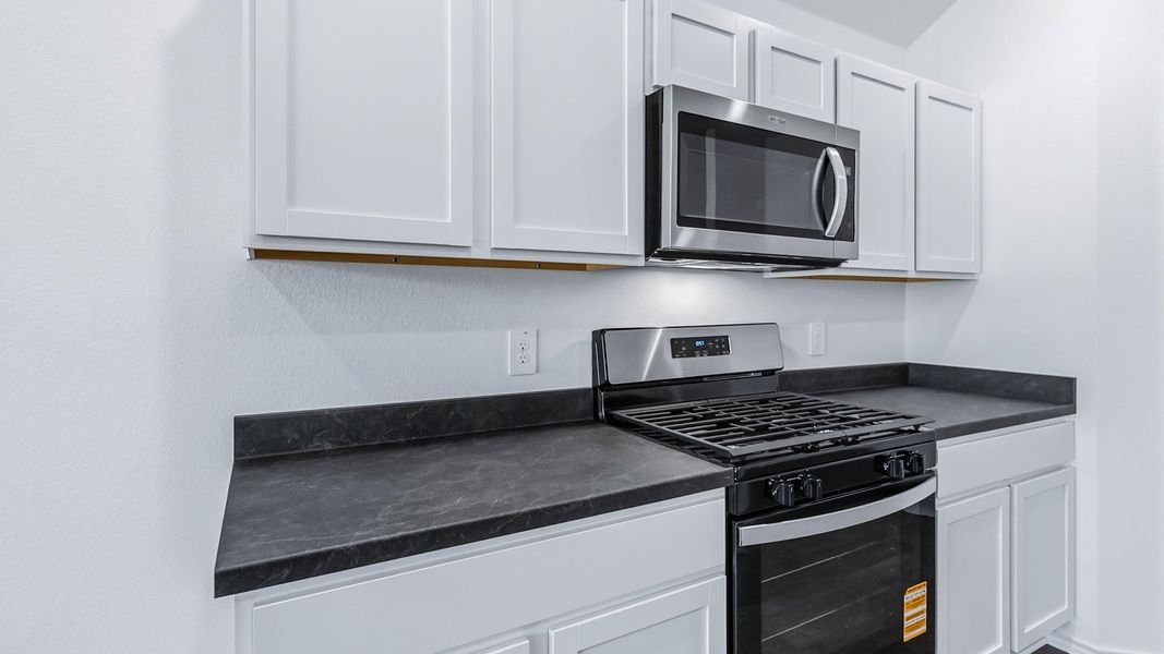 Representative furnished interior of a home built from the The Easton by D.R. Horton in Wayside, Uhland (Image 11).