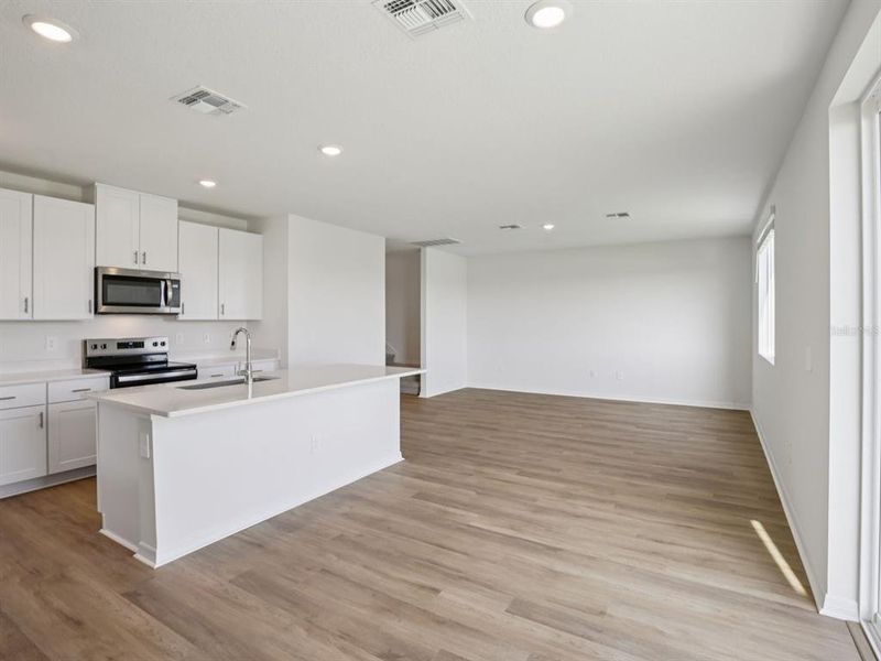 Spacious, unfurnished interior of a new home in Oakfield Trails - Premier Series, Parrish (Image 13).