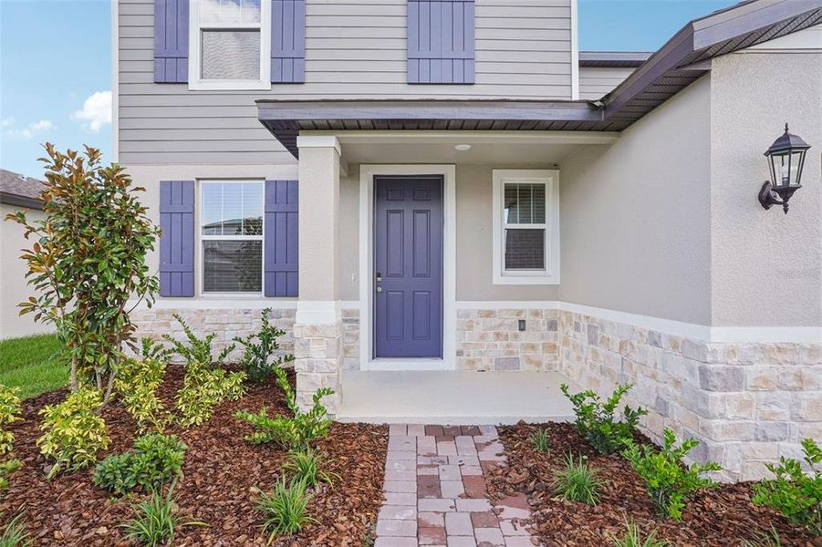 Exterior details and patio area of a home in The Meadow at Crossprairie, St. Cloud (Image 23).