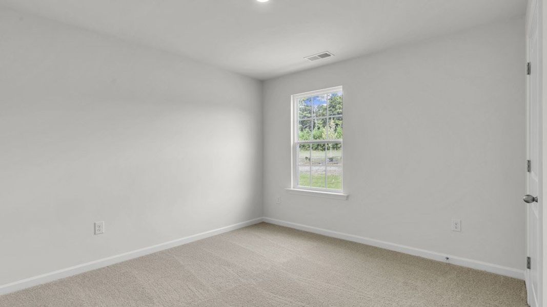 Spacious, unfurnished interior of a new home in The Preserve at Kinsley, Jamestown (Image 17). Spacious, unfurnished interior of a new home in The Preserve at Kinsley, Jamestown (Image 17).