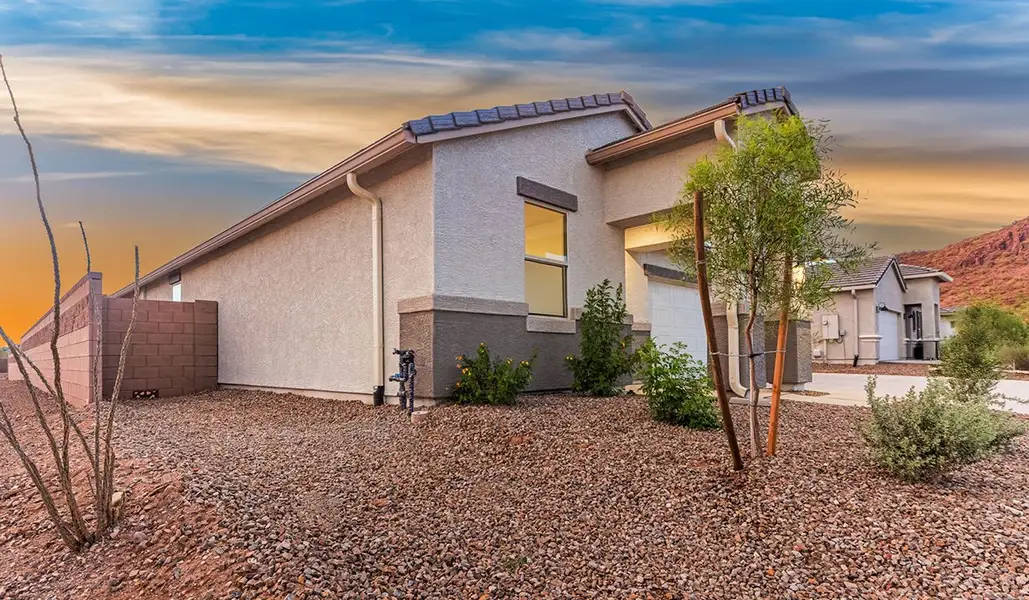 Exterior details and patio area of a home in Saguaro Bloom, Marana (Image 2). Exterior details and patio area of a home in Saguaro Bloom, Marana (Image 2).