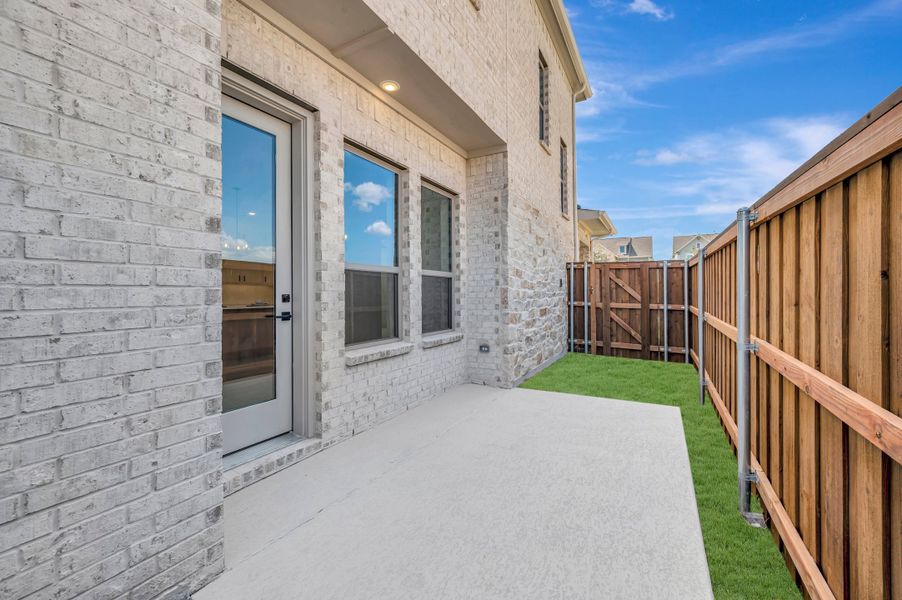 Exterior details and patio area of a home in Walsh Cottage, Fort Worth (Image 3).