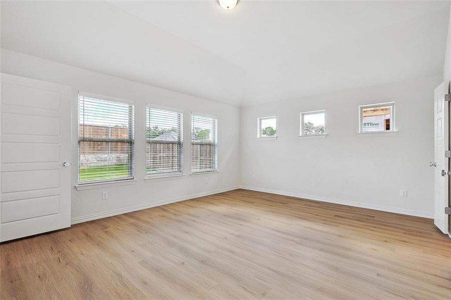 Unfurnished room with light hardwood / wood-style flooring