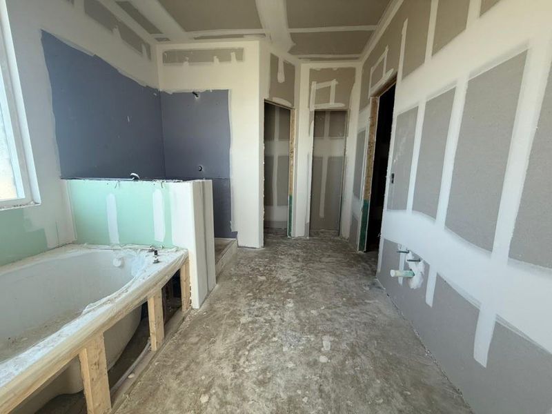 Bathroom featuring a garden tub Bathroom featuring a garden tub