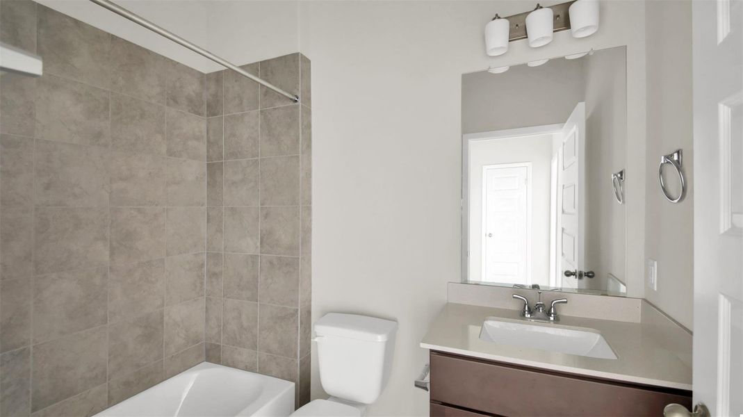 Full bathroom with vanity and shower / washtub combination