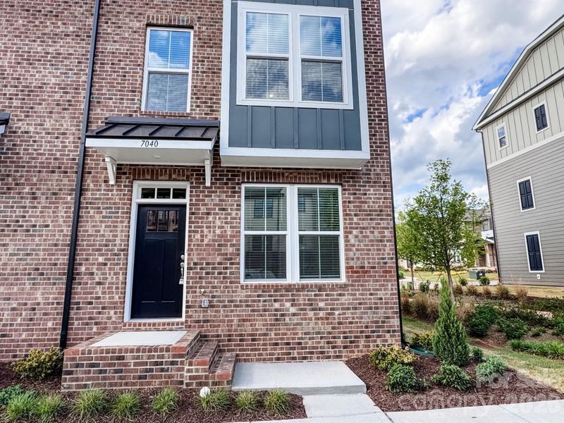Exterior details and patio area of a home in , Charlotte (Image 19).