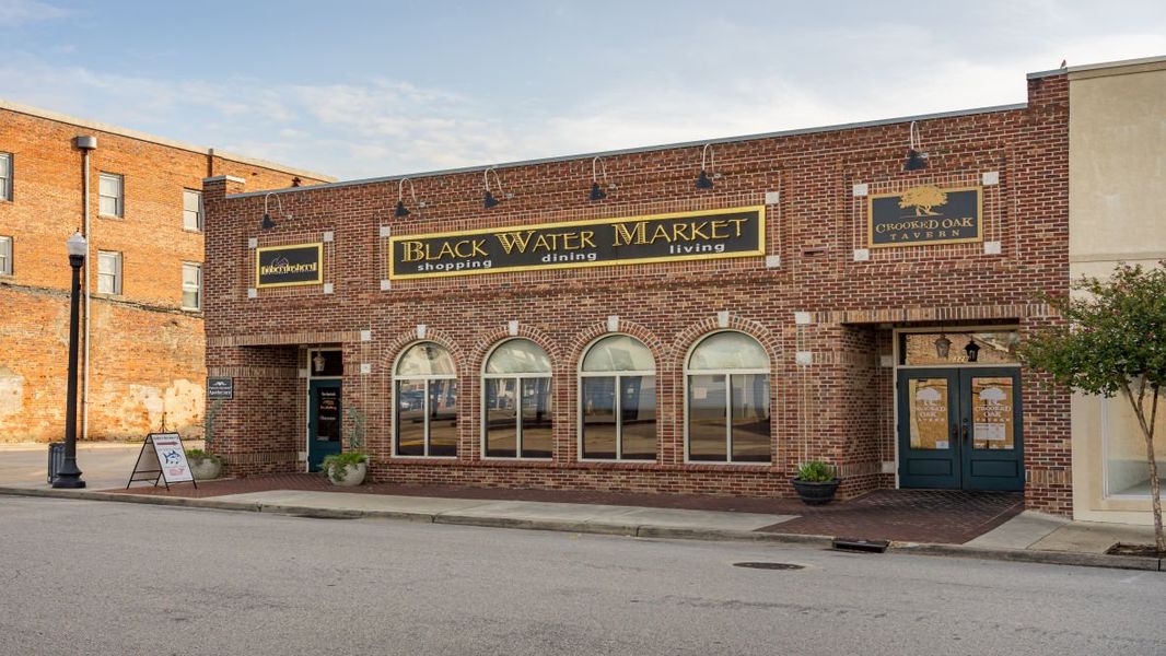 Front exterior of a new home in Kingston Bay, Conway, SC, highlighting curb appeal (Image 18).