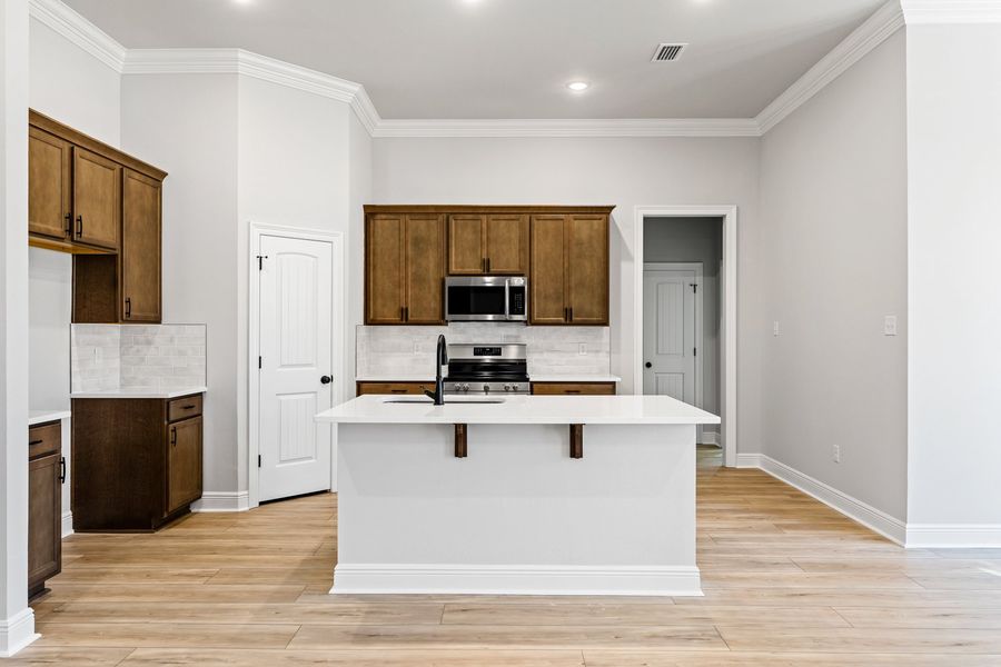 Furnished interior view inside a new home in Young Oaks, Crestview (Image 9).