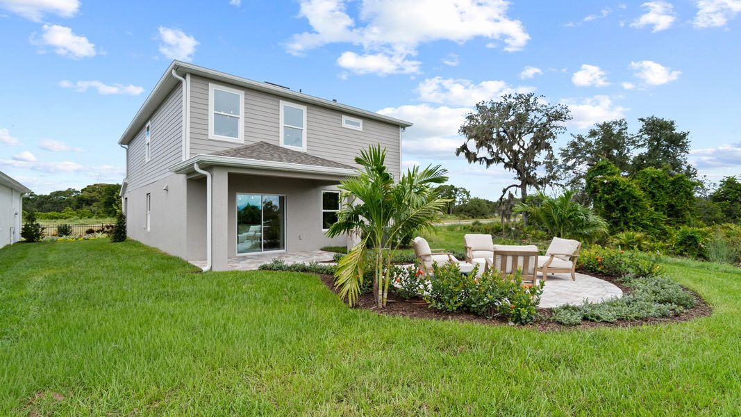Representative exterior photo of a completed home built from the Ponte Verde by DRB Homes in Willowbrook North, Winter Haven, FL (Image 28). Representative exterior photo of a completed home built from the Ponte Verde by DRB Homes in Willowbrook North, Winter Haven, FL (Image 28).