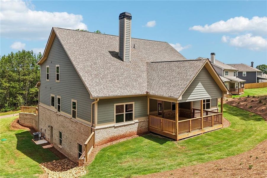 Exterior details and patio area of a home in Steeplechase, Hoschton (Image 4).