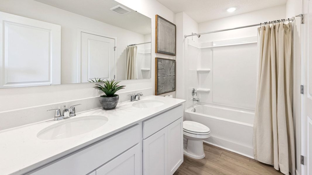 Furnished interior view inside a new home in Vineland Reserve, Osteen (Image 9).