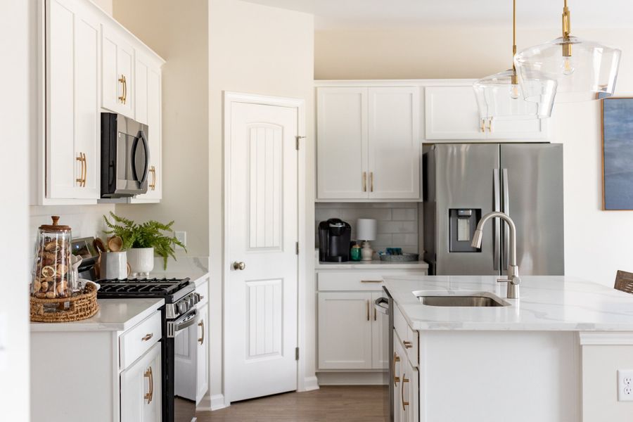 Representative furnished interior of a home built from the The Magnolia by Smith Family Homes in Majestic Oaks, Brunswick (Image 11).