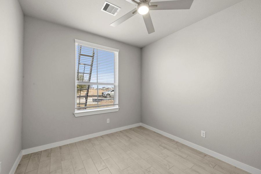 Spacious, unfurnished interior of a new home in Sunterra Lakes, Fulshear (Image 26).