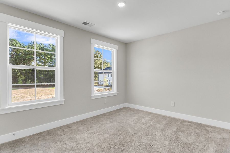 Spacious, unfurnished interior of a new home in Pineland Preserve, Summerville (Image 49).