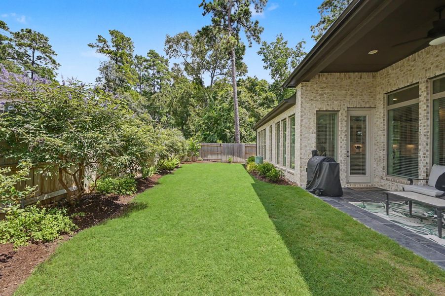 Another view of the easy to maintain backyard with flowering shrubs for some color. Such a peaceful spot to enjoy at the end of a long day! Another view of the easy to maintain backyard with flowering shrubs for some color. Such a peaceful spot to enjoy at the end of a long day!