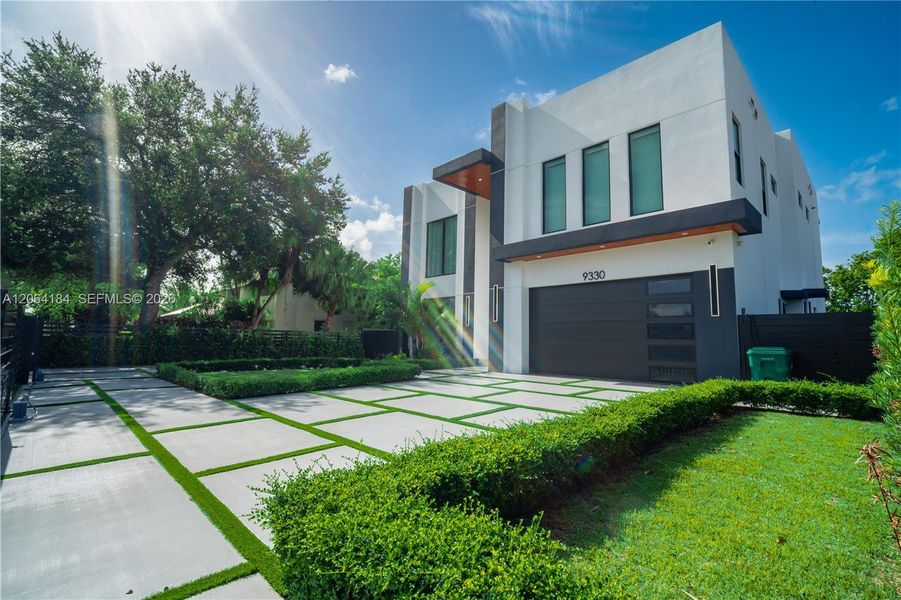 Front exterior of a new home in , Miami, FL, highlighting curb appeal (Image 2). Front exterior of a new home in , Miami, FL, highlighting curb appeal (Image 2).