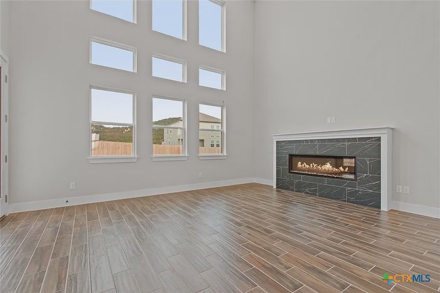 Spacious, unfurnished interior of a new home in Lakeside at Tessera on Lake Travis, Lago Vista (Image 17). Spacious, unfurnished interior of a new home in Lakeside at Tessera on Lake Travis, Lago Vista (Image 17).