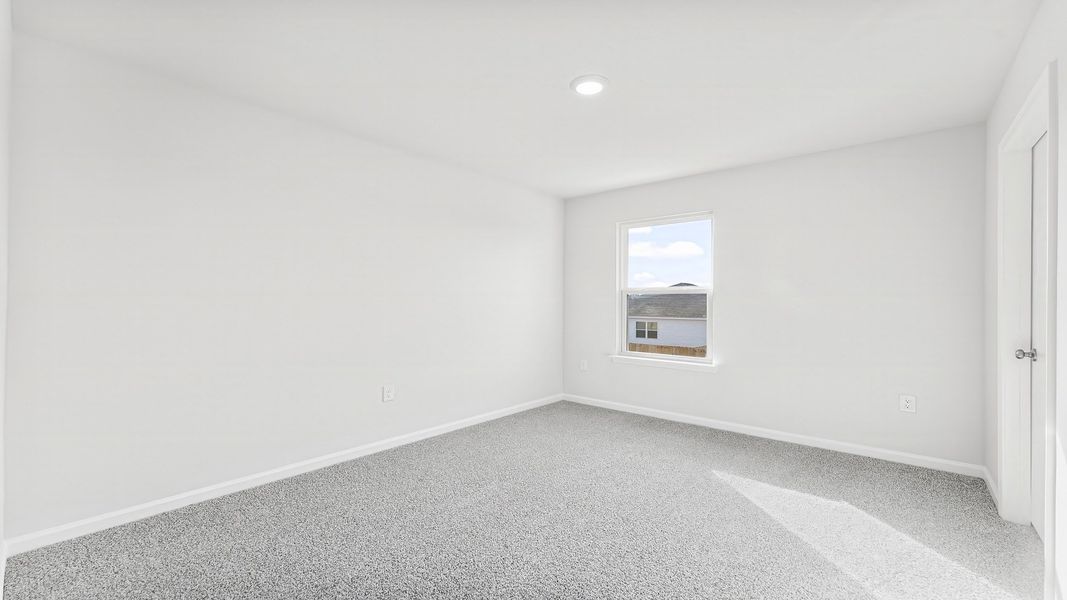 Representative unfurnished interior of a home built from the The Aisle by D.R. Horton in Titus Park, Panama City (Image 32).