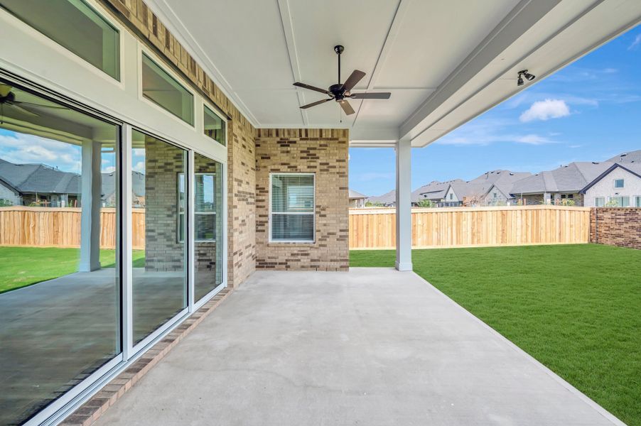 Exterior details and patio area of a home in Dunham Pointe - Parkview Collection, Cypress (Image 4).