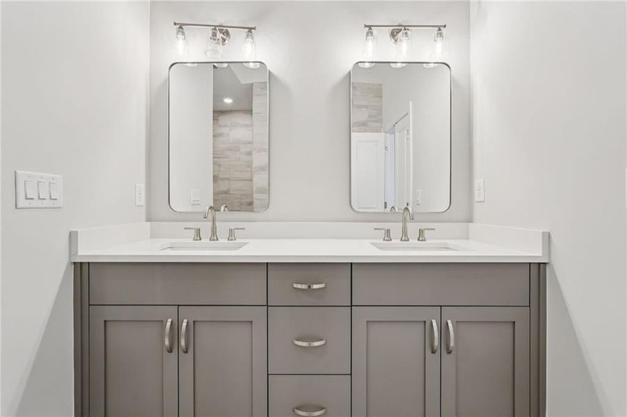 Bathroom featuring double vanity