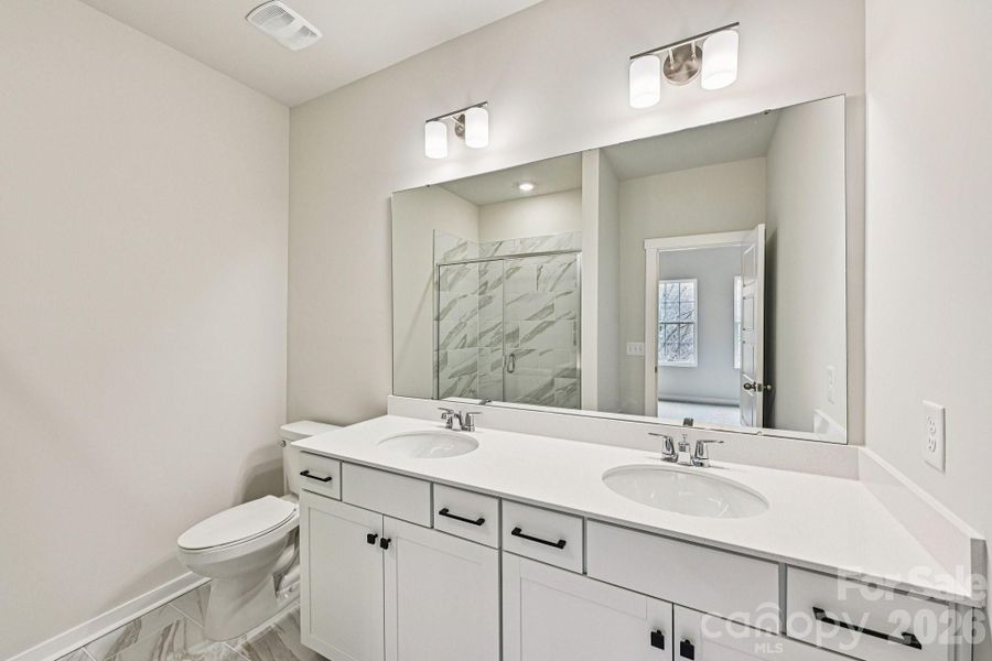 Furnished interior view inside a new home in Vanguard at Vermillion, Huntersville (Image 10). Furnished interior view inside a new home in Vanguard at Vermillion, Huntersville (Image 10).