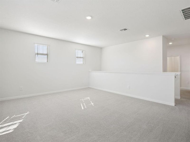 Spacious, unfurnished interior of a new home in Coasterra - Reserve Series, Palmetto (Image 10).