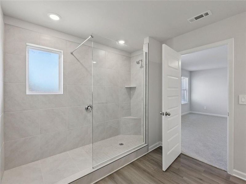 Furnished interior view inside a new home in Martin Springs - Estate Series, Lawrenceville (Image 11).