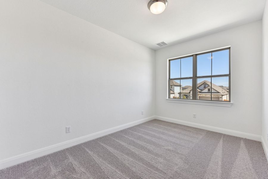 Spacious, unfurnished interior of a new home in 6 Creeks, Kyle (Image 14).