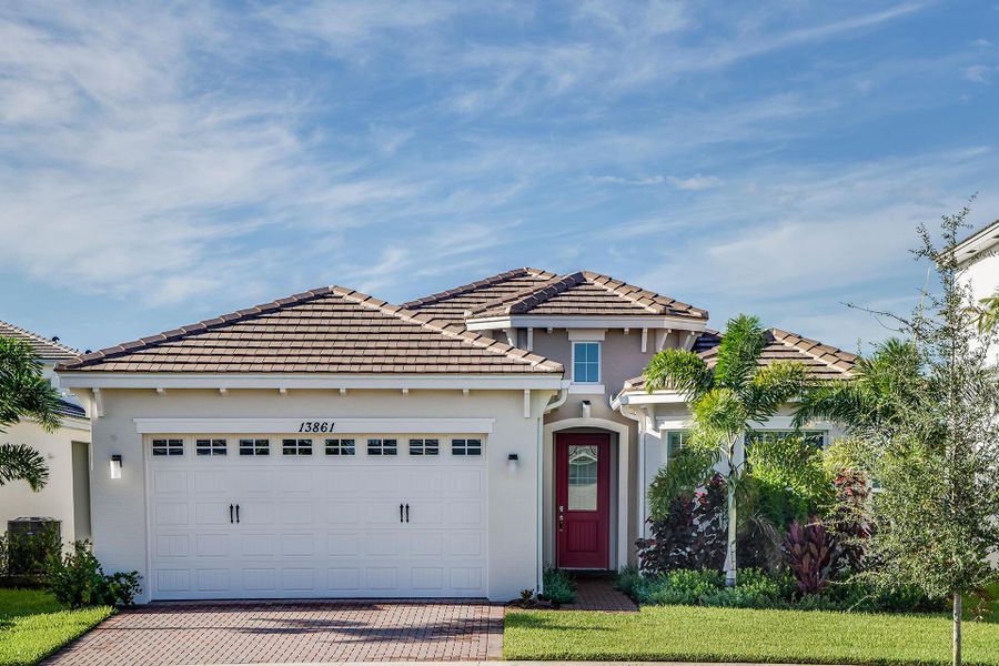 Front exterior of a new home in Westlake, Westlake, FL, highlighting curb appeal (Image 1). Front exterior of a new home in Westlake, Westlake, FL, highlighting curb appeal (Image 1).