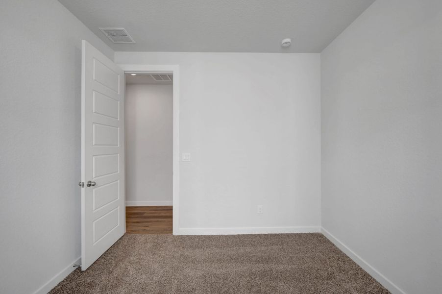 Spacious, unfurnished interior of a new home in The Meadows at Hunters Ranch, San Antonio (Image 41).